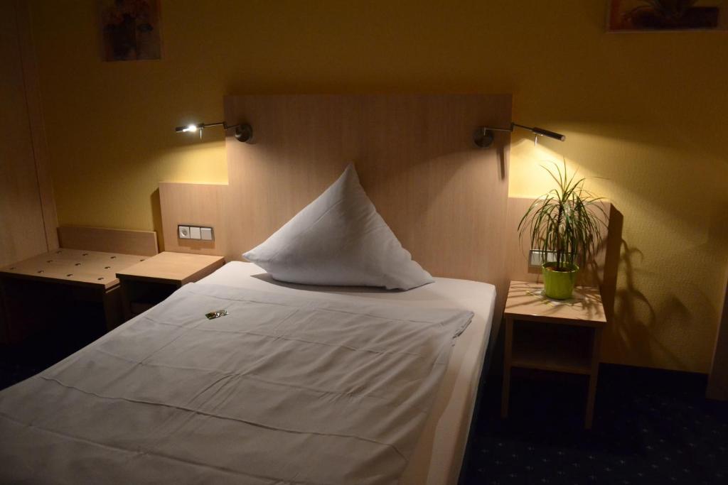 Postel nebo postele na pokoji v ubytování Landgasthof Hock