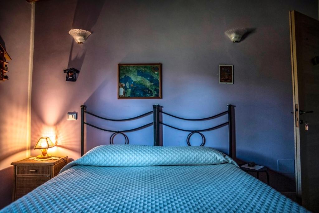 Łóżko lub łóżka w pokoju w obiekcie Villa Farfalla Bianca