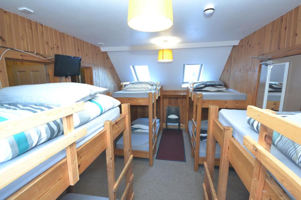 Postel nebo postele na pokoji v ubytování Blackwater Hostel