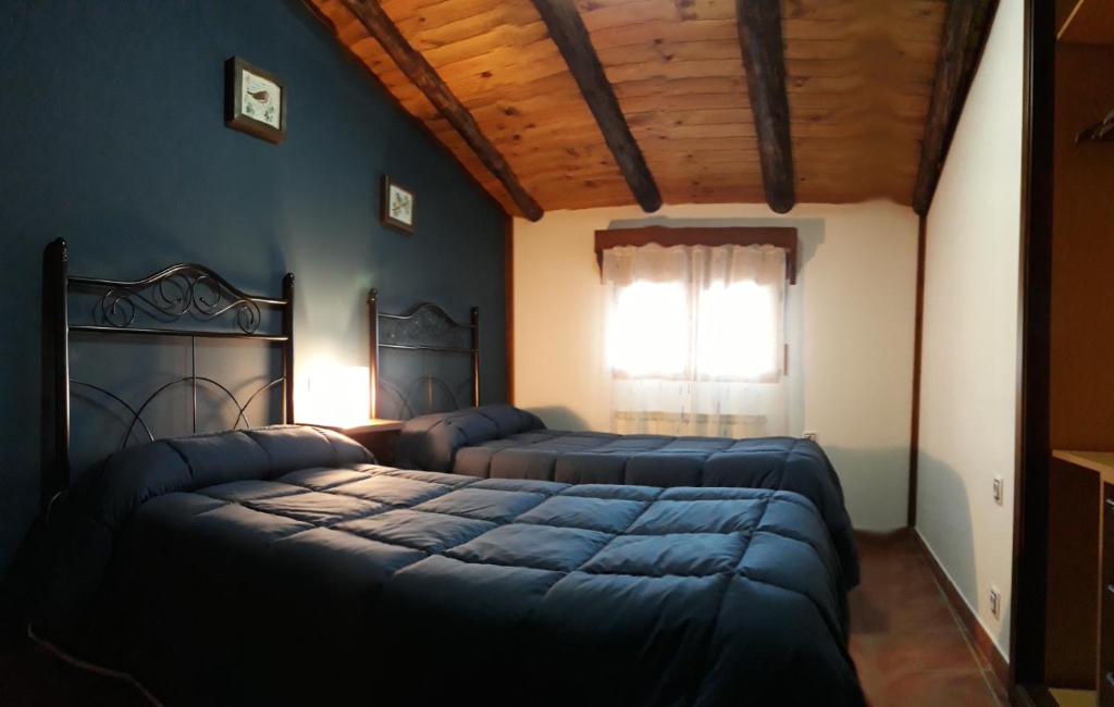 Postel nebo postele na pokoji v ubytování Casa Aldea