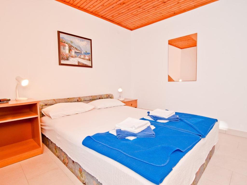 Posteľ alebo postele v izbe v ubytovaní Mali Losinj Apartment 6