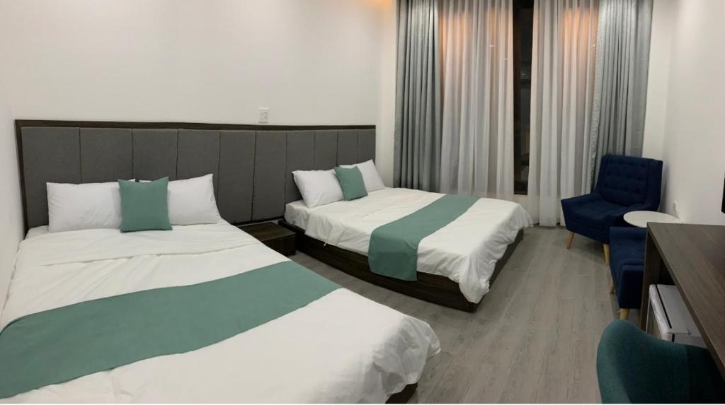 Postel nebo postele na pokoji v ubytování Home Thiên Trang 3