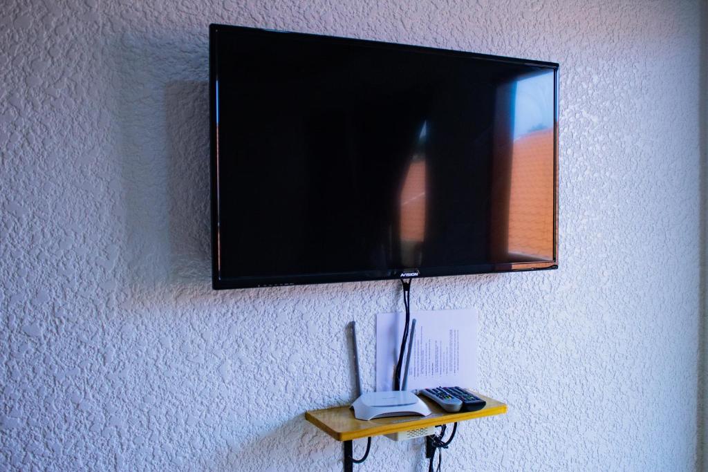 TV a/nebo společenská místnost v ubytování Sunville Hotel and Restaurant