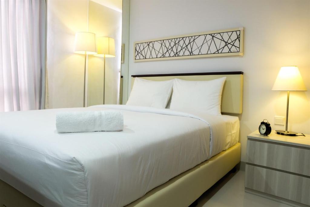 Studio Room Azalea Suites Apartment By Travelio