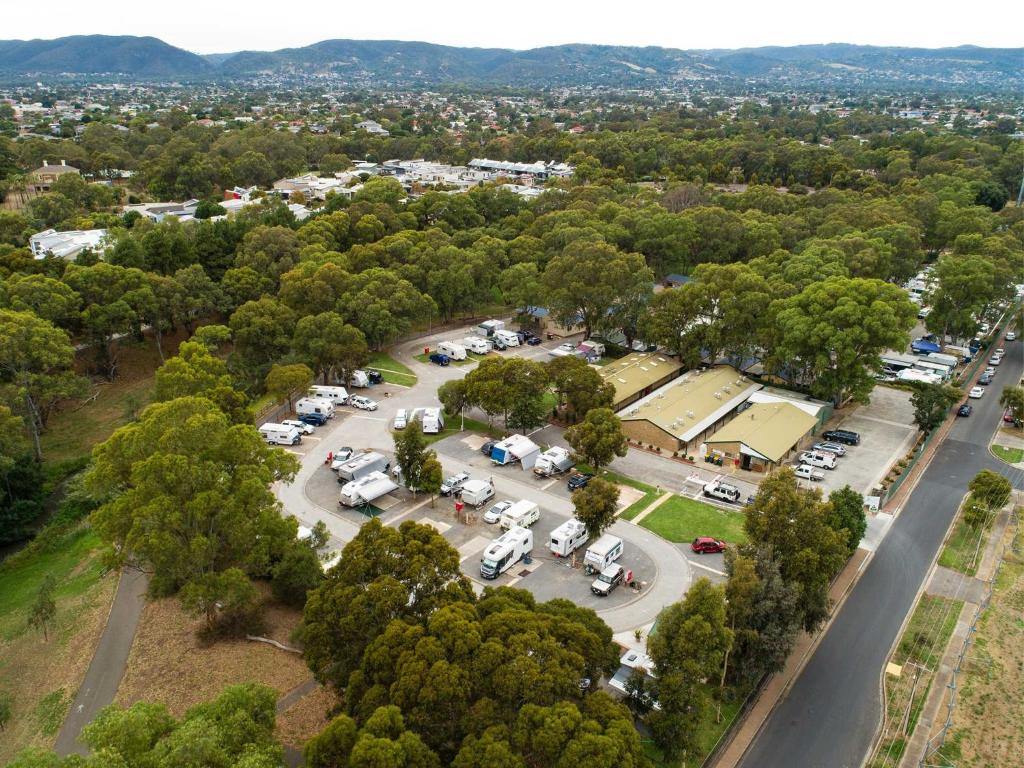 an aerial view of a parking lot with cars parked at Windsor Gardens Caravan Park in Adelaide