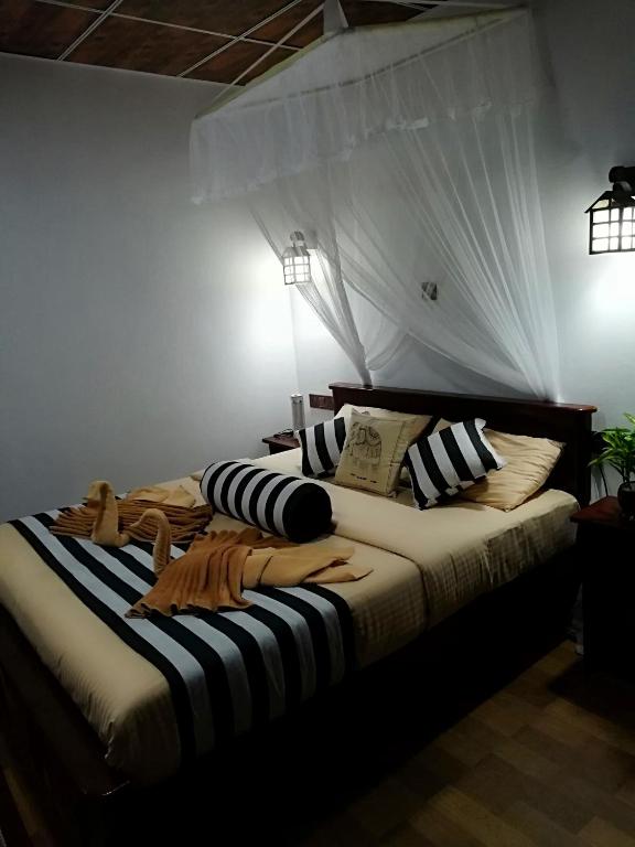 Postel nebo postele na pokoji v ubytování Home Away Ella
