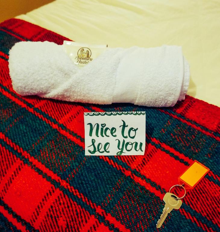 Letto o letti in una camera di Eco Aventura Hostel Cusco
