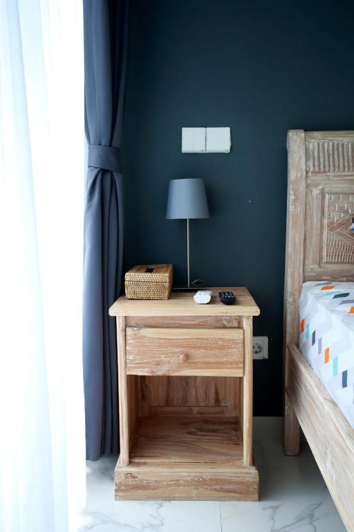 Postel nebo postele na pokoji v ubytování Vanilla Suite Jimbaran