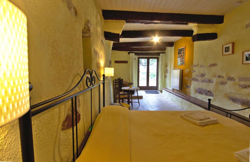 a bedroom with a bed in a room at La Girandola in Cupramontana