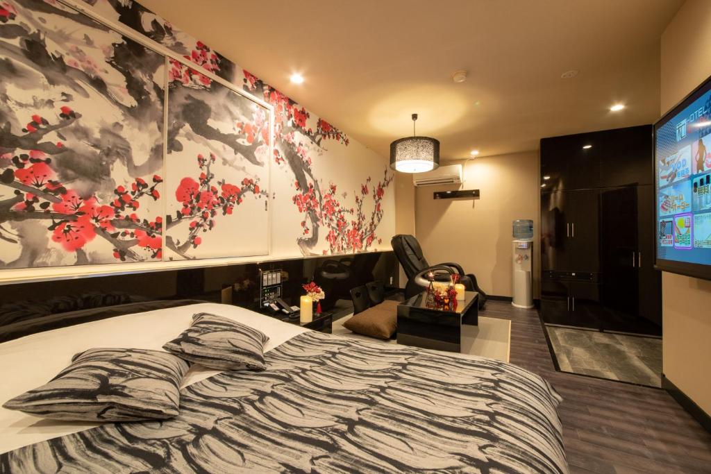 TV a/nebo společenská místnost v ubytování Hotel Waraku Shibukawa