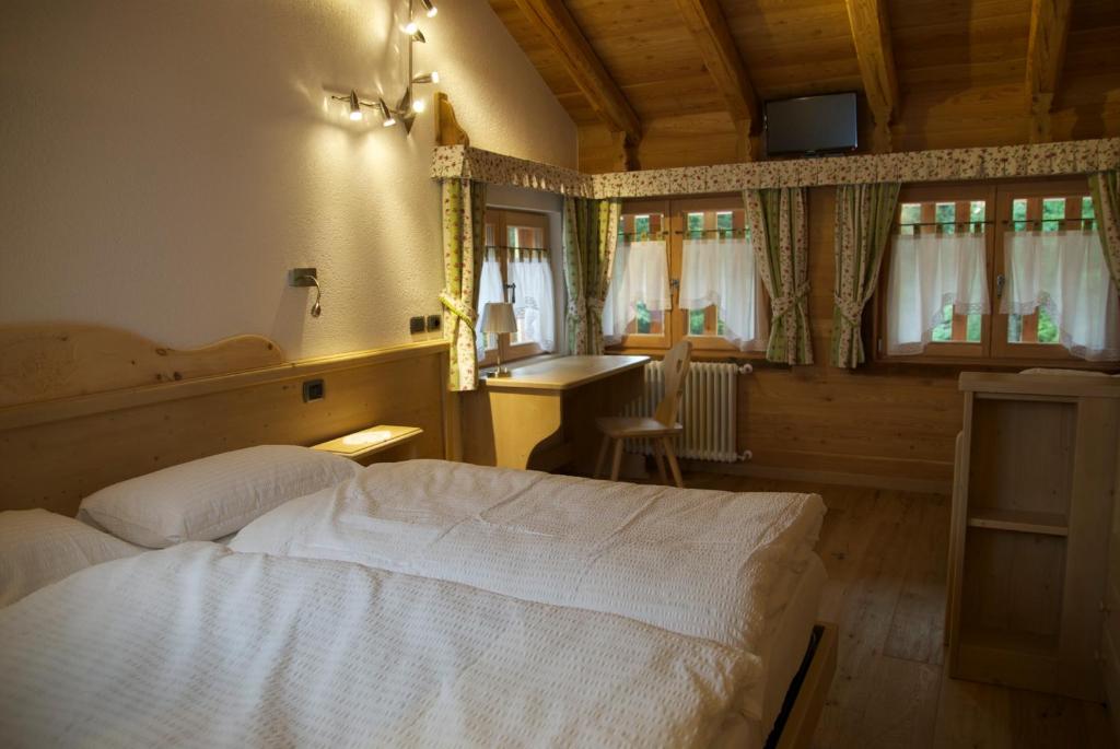 Postel nebo postele na pokoji v ubytování Maso Coler