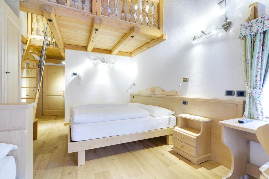 Postel nebo postele na pokoji v ubytování Maso Coler