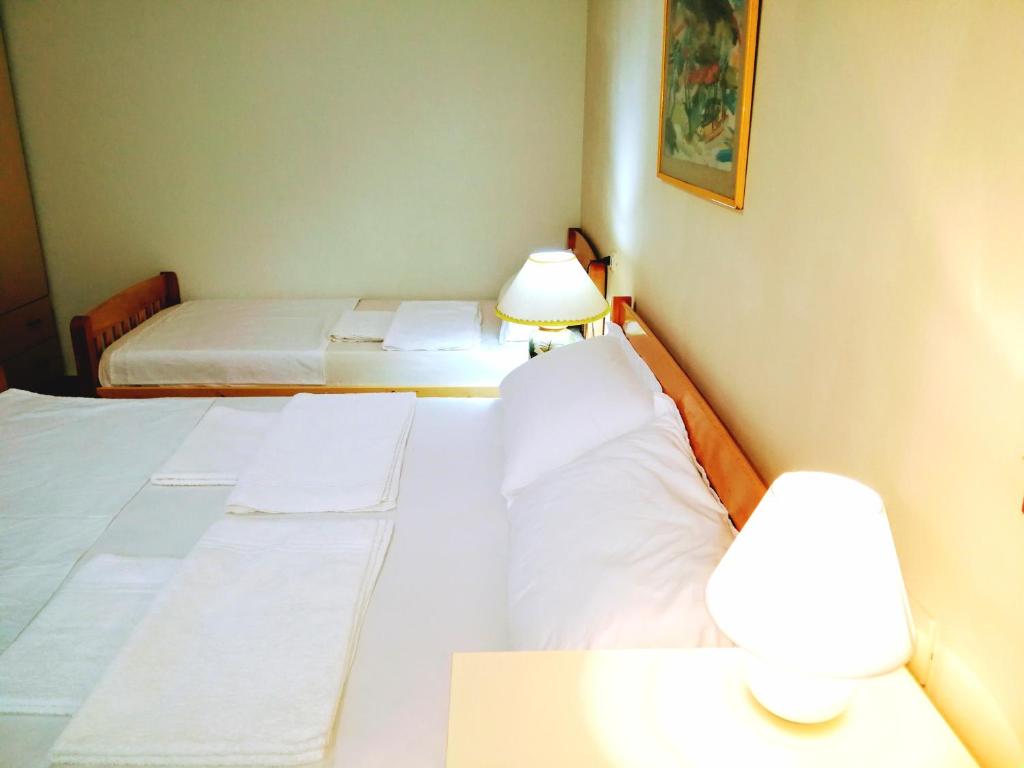 Voodi või voodid majutusasutuse Turtle Apartment toas