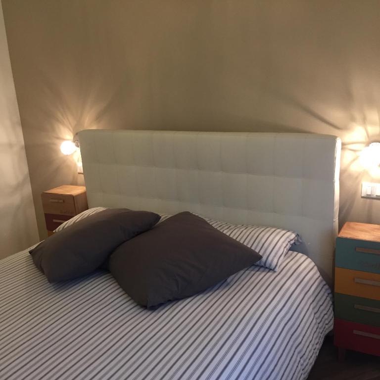 Postel nebo postele na pokoji v ubytování Mazzini 33