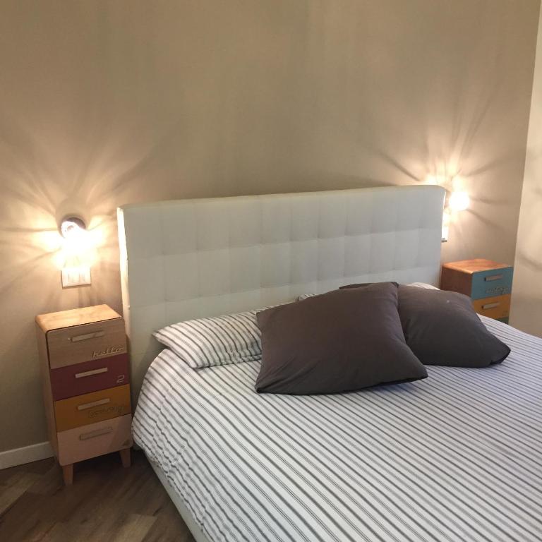 Postel nebo postele na pokoji v ubytování Mazzini 33
