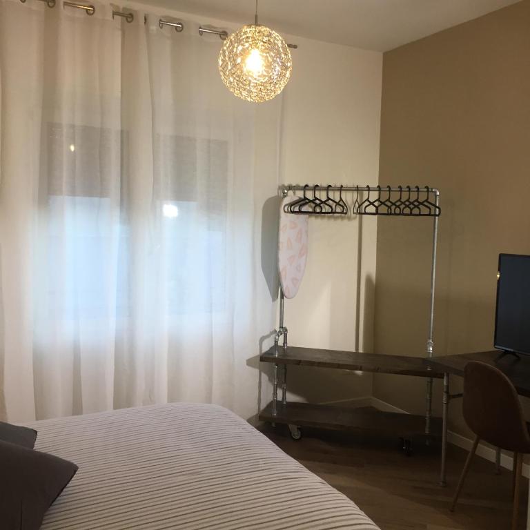 Postel nebo postele na pokoji v ubytování Mazzini 33