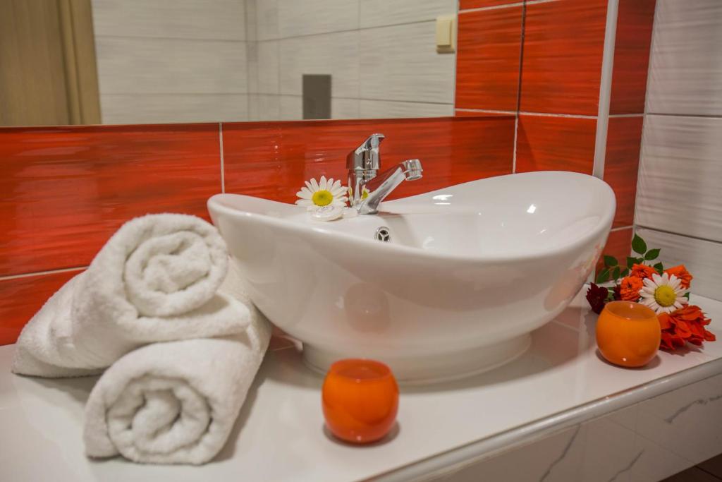 Koupelna v ubytování Kozanos Hotel & Suites