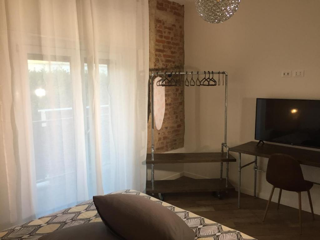 TV a/nebo společenská místnost v ubytování Mazzini 33