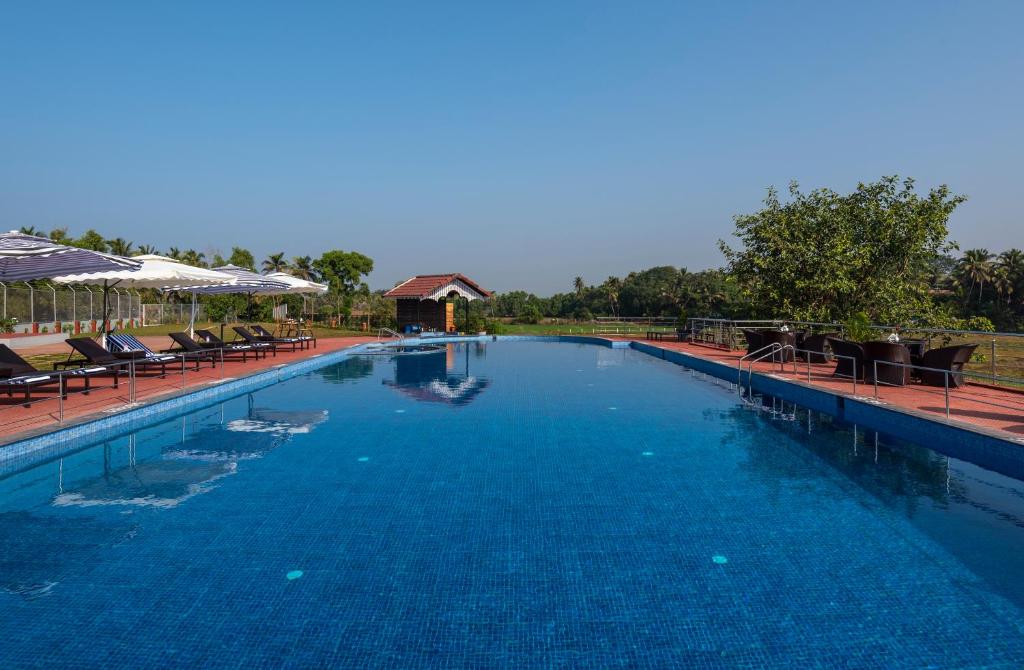 Bazén v ubytování Salcete Beach Resort nebo v jeho okolí