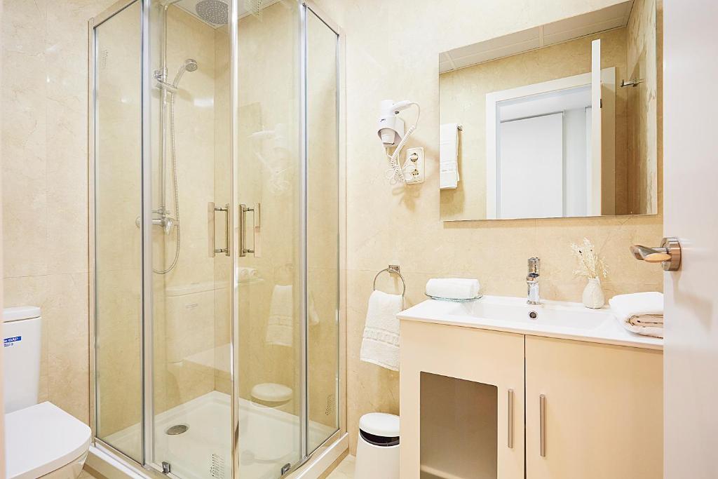 Koupelna v ubytování LEEWAYS LOFT IV in GRAN VÍA