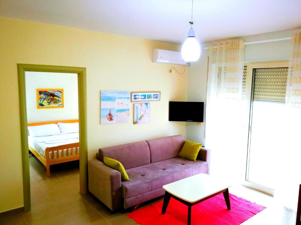 Televiisor ja/või meelelahutuskeskus majutusasutuses Turtle Apartment