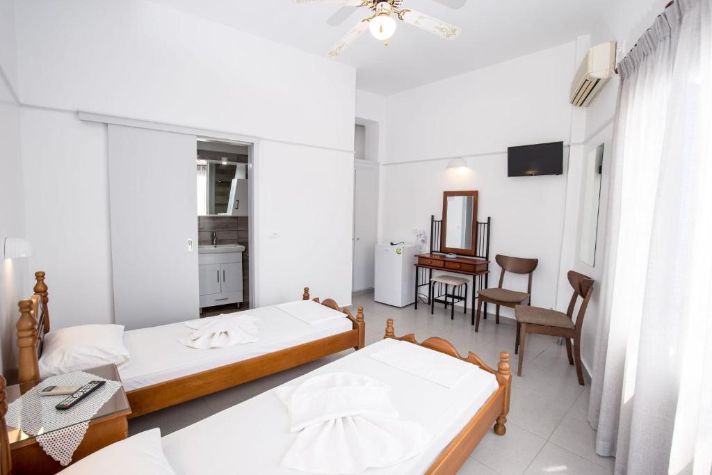 Postel nebo postele na pokoji v ubytování Hotel Sofia