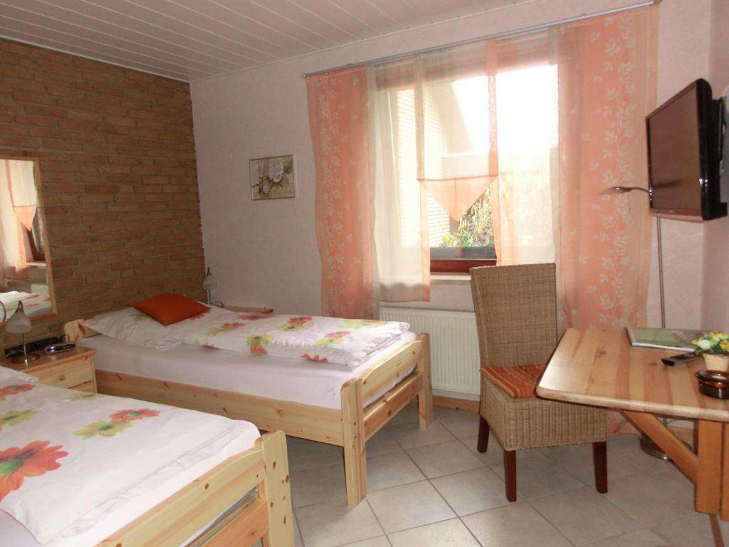 Postel nebo postele na pokoji v ubytování Ullas Gästehaus