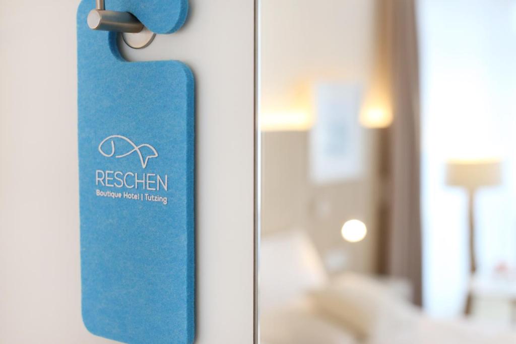 Postel nebo postele na pokoji v ubytování Boutique Hotel Reschen