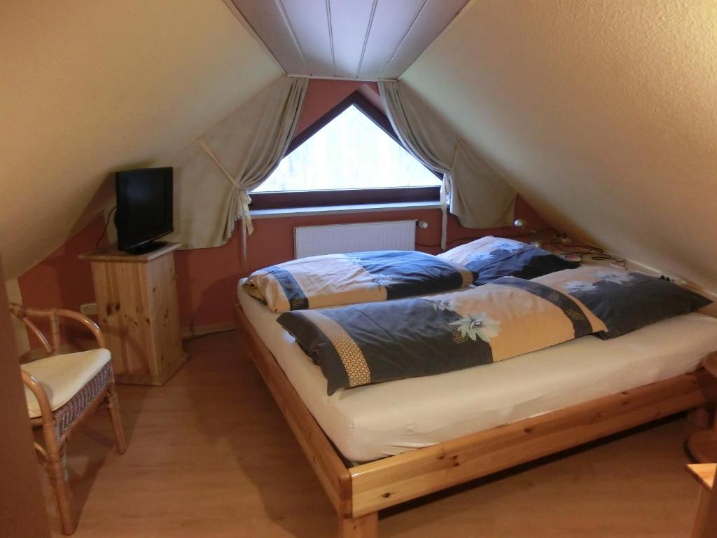 Postel nebo postele na pokoji v ubytování Ullas Gästehaus