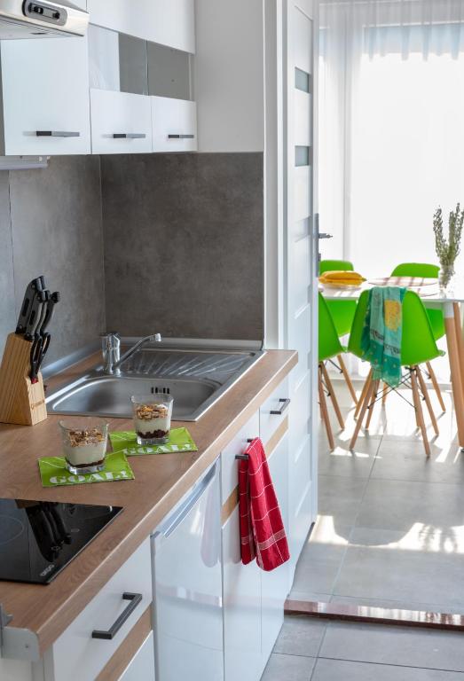 Kuchyň nebo kuchyňský kout v ubytování Apartmani Dalmacjia