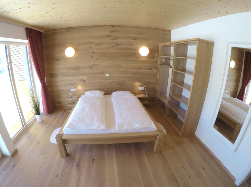 Posteľ alebo postele v izbe v ubytovaní Ferienbungalow Mountain View Wood
