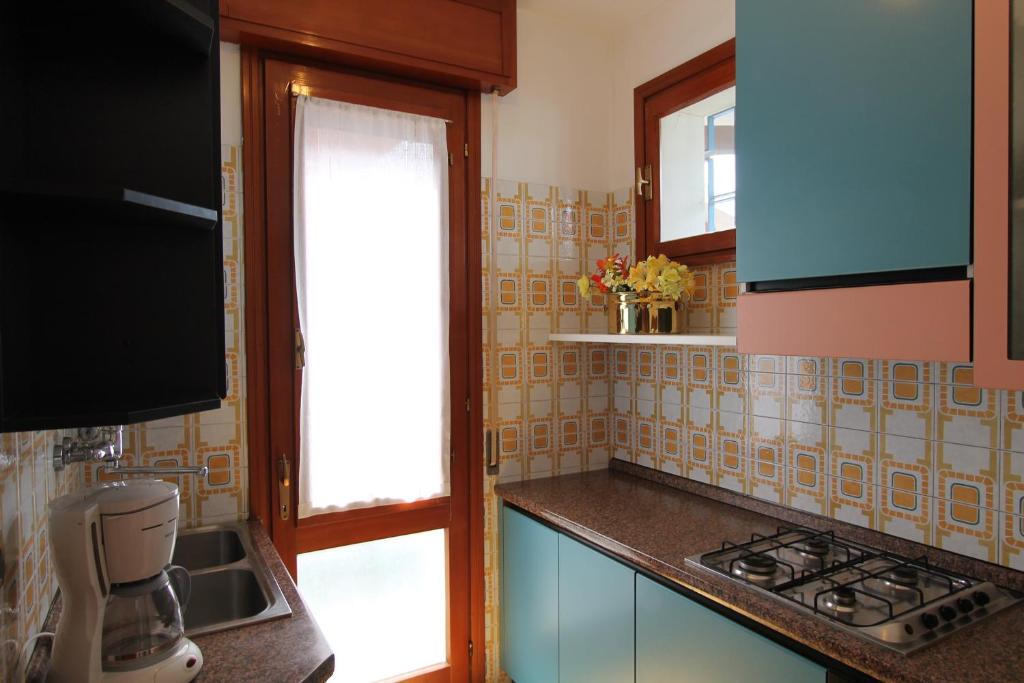 A kitchen or kitchenette at Villa Agavi