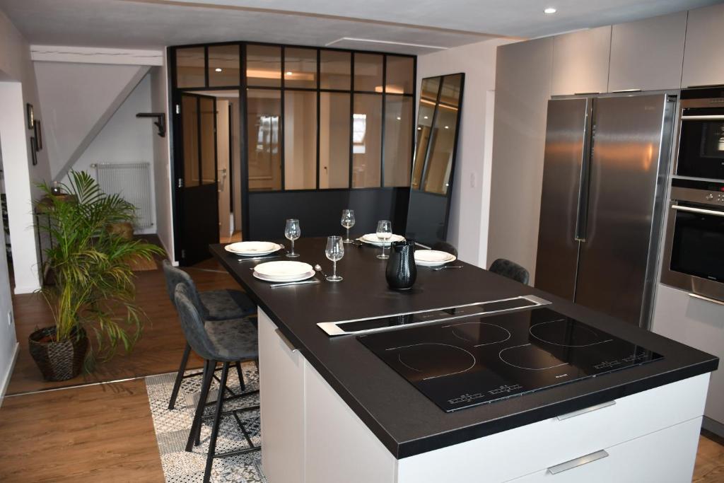 Kuchyň nebo kuchyňský kout v ubytování Chambres d'hôtes L'Ecrin des Saveurs