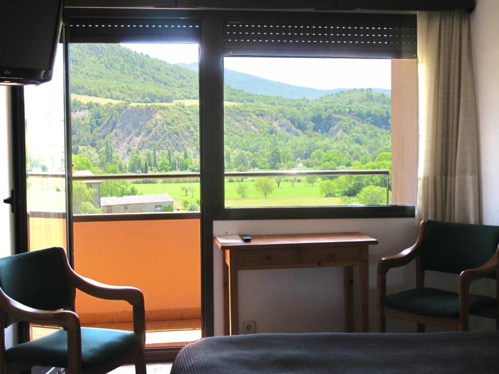 Nespecifikovaný výhled na hory nebo výhled na hory při pohledu z hotelu