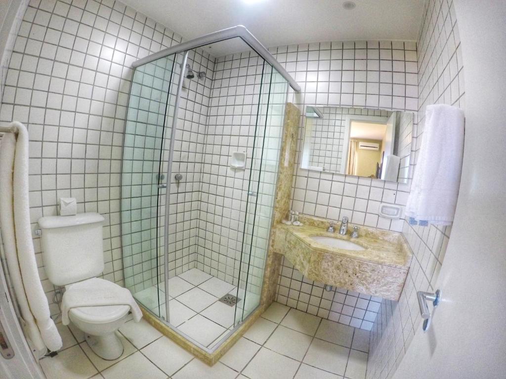 Koupelna v ubytování Portogalo Suite Hotel