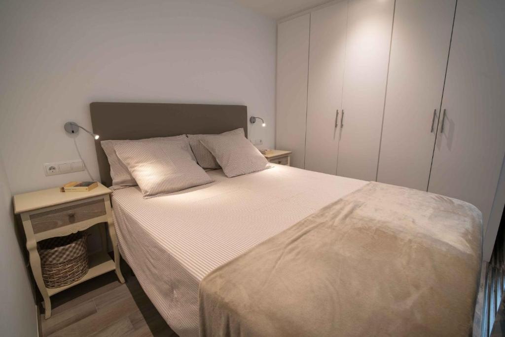 Postel nebo postele na pokoji v ubytování Apartament Cortey