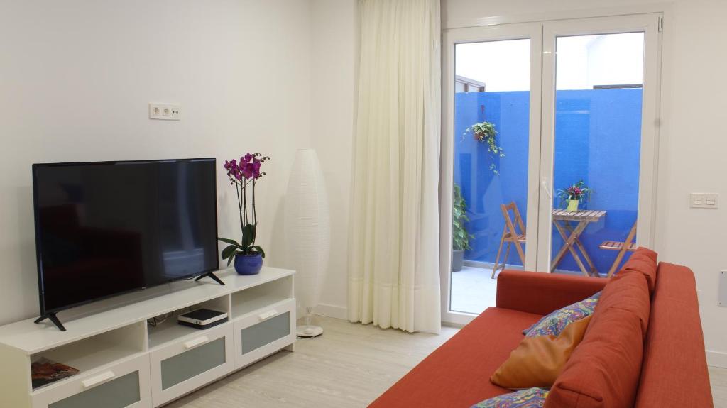 TV a/nebo společenská místnost v ubytování Piso Lagunero Acogedor