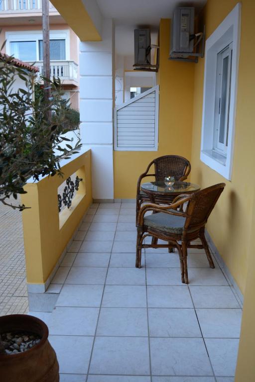 A balcony or terrace at Raph's Studios-Apts By The Sea