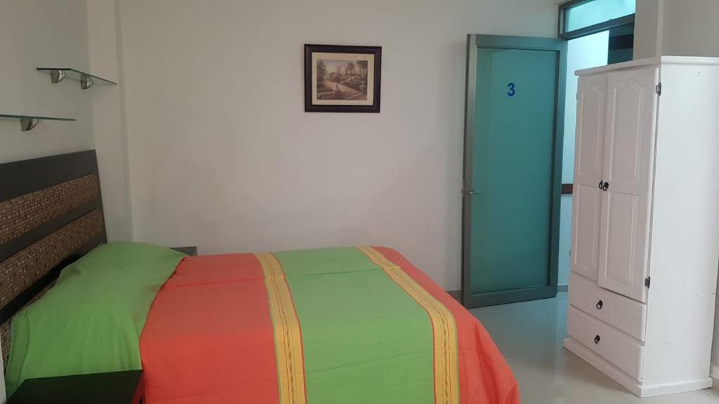 Postel nebo postele na pokoji v ubytování Casa Ana Celia