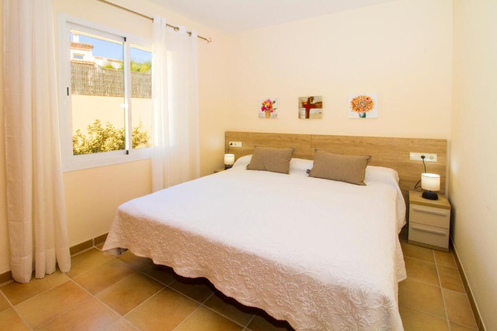 Postel nebo postele na pokoji v ubytování Villa del Mar