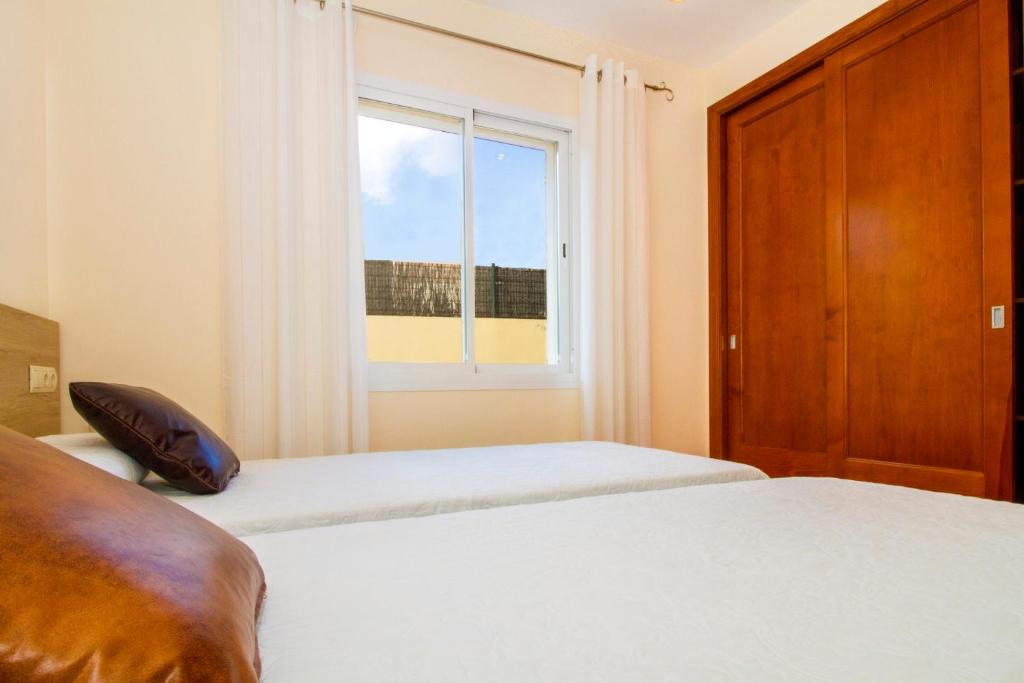 Postel nebo postele na pokoji v ubytování Villa del Mar