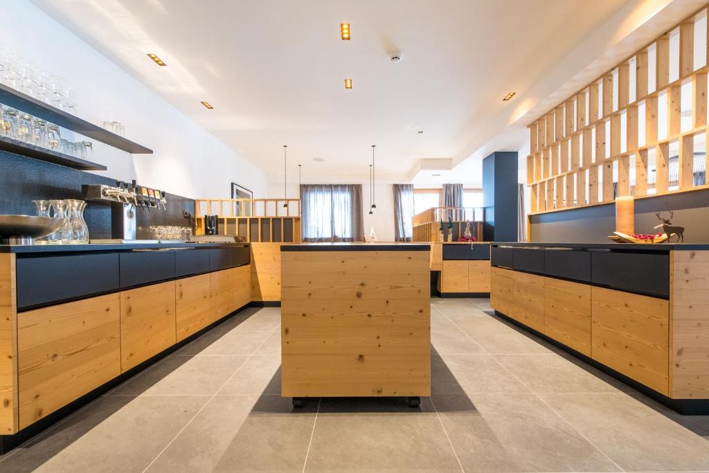 Kuchyň nebo kuchyňský kout v ubytování Hotel Alpenrast
