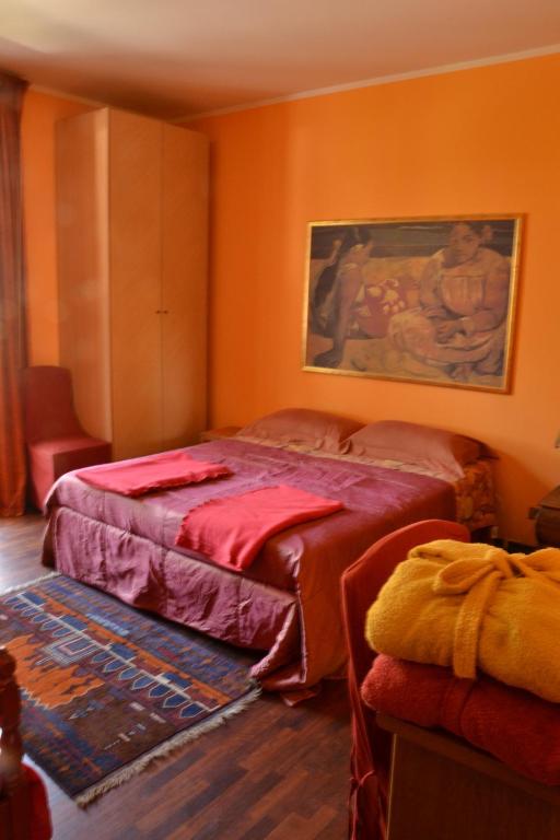Postel nebo postele na pokoji v ubytování B&B Al Mare Di Greis