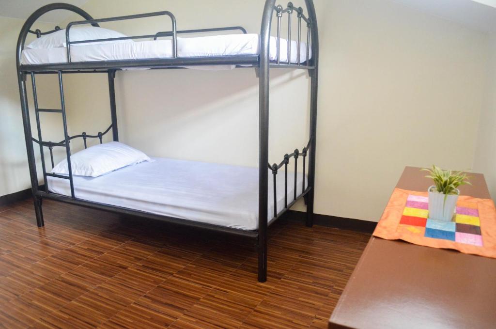 Postel nebo postele na pokoji v ubytování DMS Apartelle