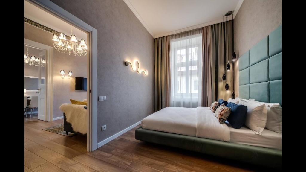 Postel nebo postele na pokoji v ubytování Lviv Apartments
