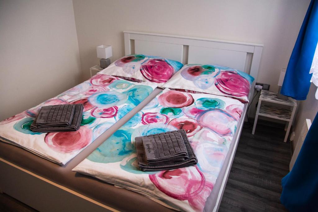 Postel nebo postele na pokoji v ubytování Apartmán Na Pekárně