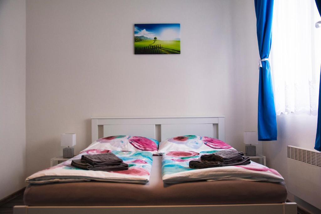Postel nebo postele na pokoji v ubytování Apartmán Na Pekárně