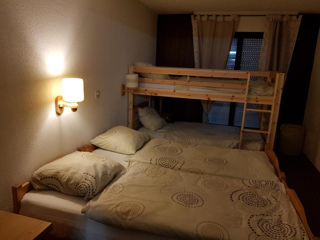 Postel nebo postele na pokoji v ubytování Appt 6-8 pers Torgon Portes du Soleil