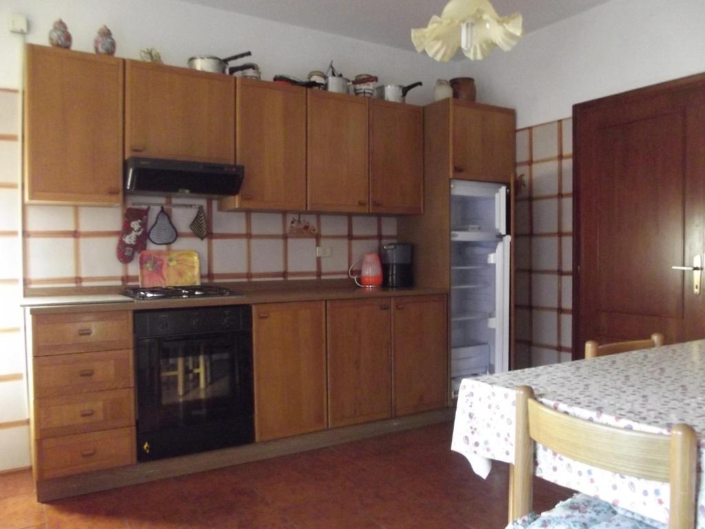Kuchyňa alebo kuchynka v ubytovaní Villa Martina