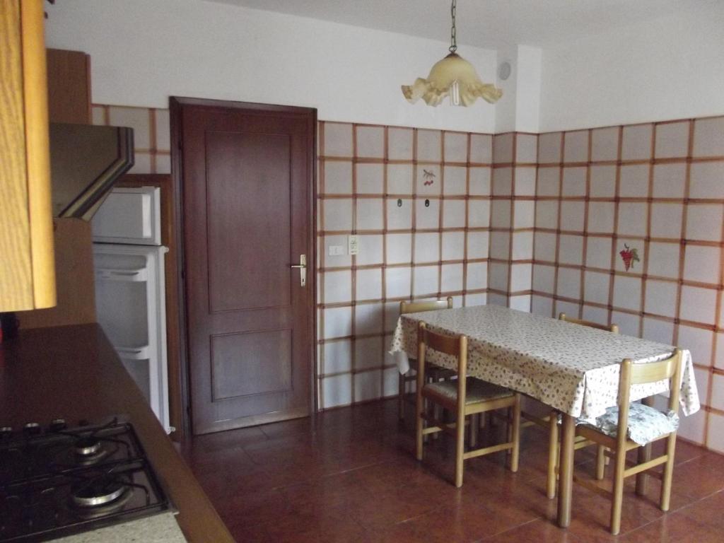 Kuchyňa alebo kuchynka v ubytovaní Villa Martina